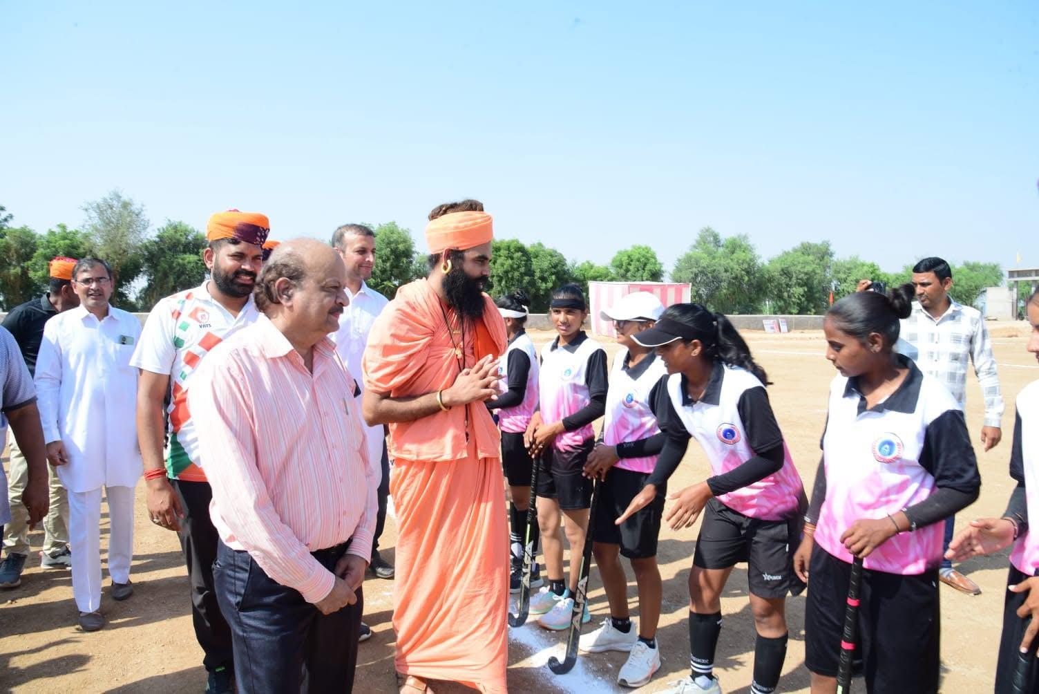Officials Visit Hockey Team